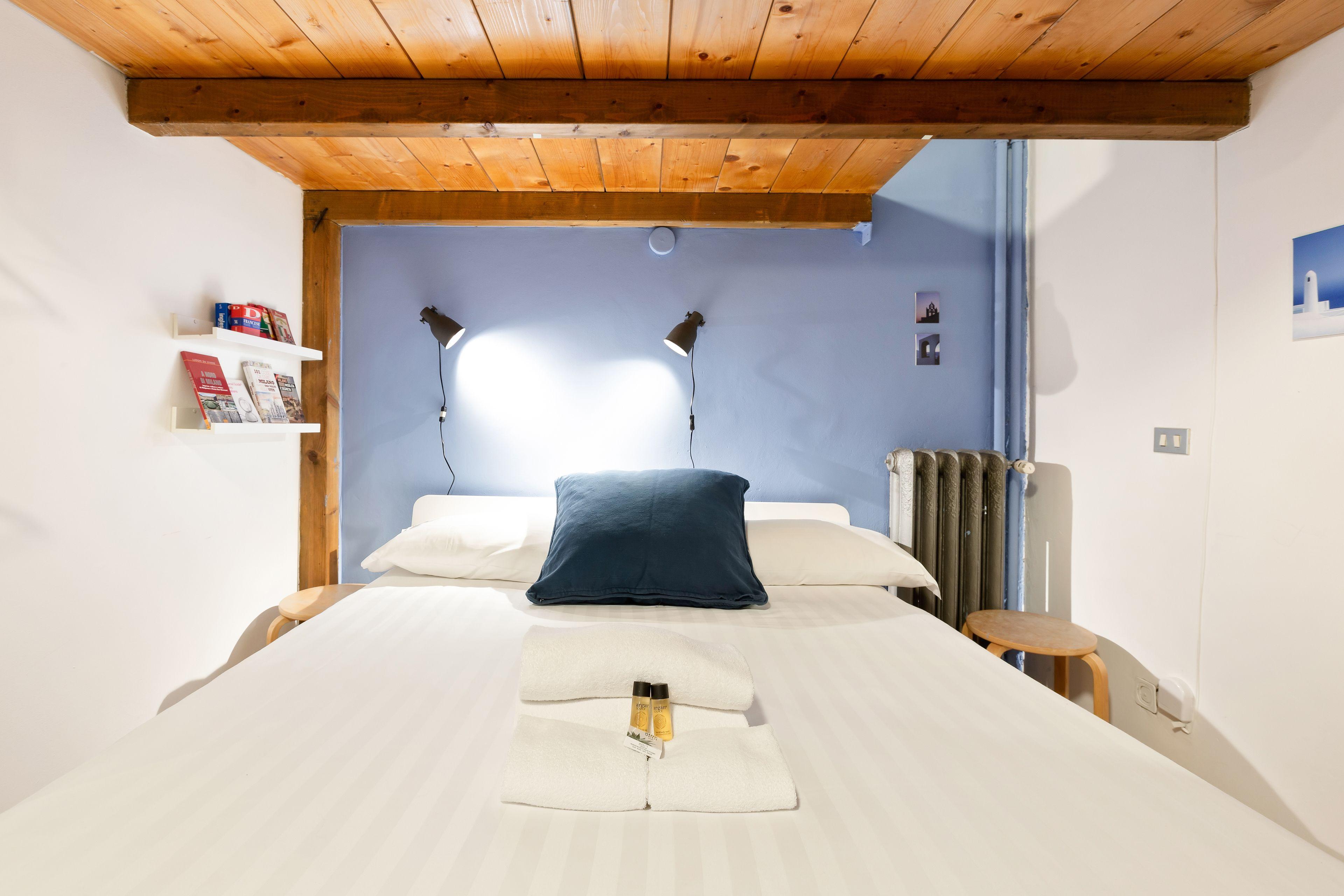 Guesthost - Cosy Nest Isola District Heart — Photos 3